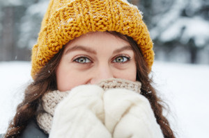 Beautiful eyes of pretty girl in knitted hat